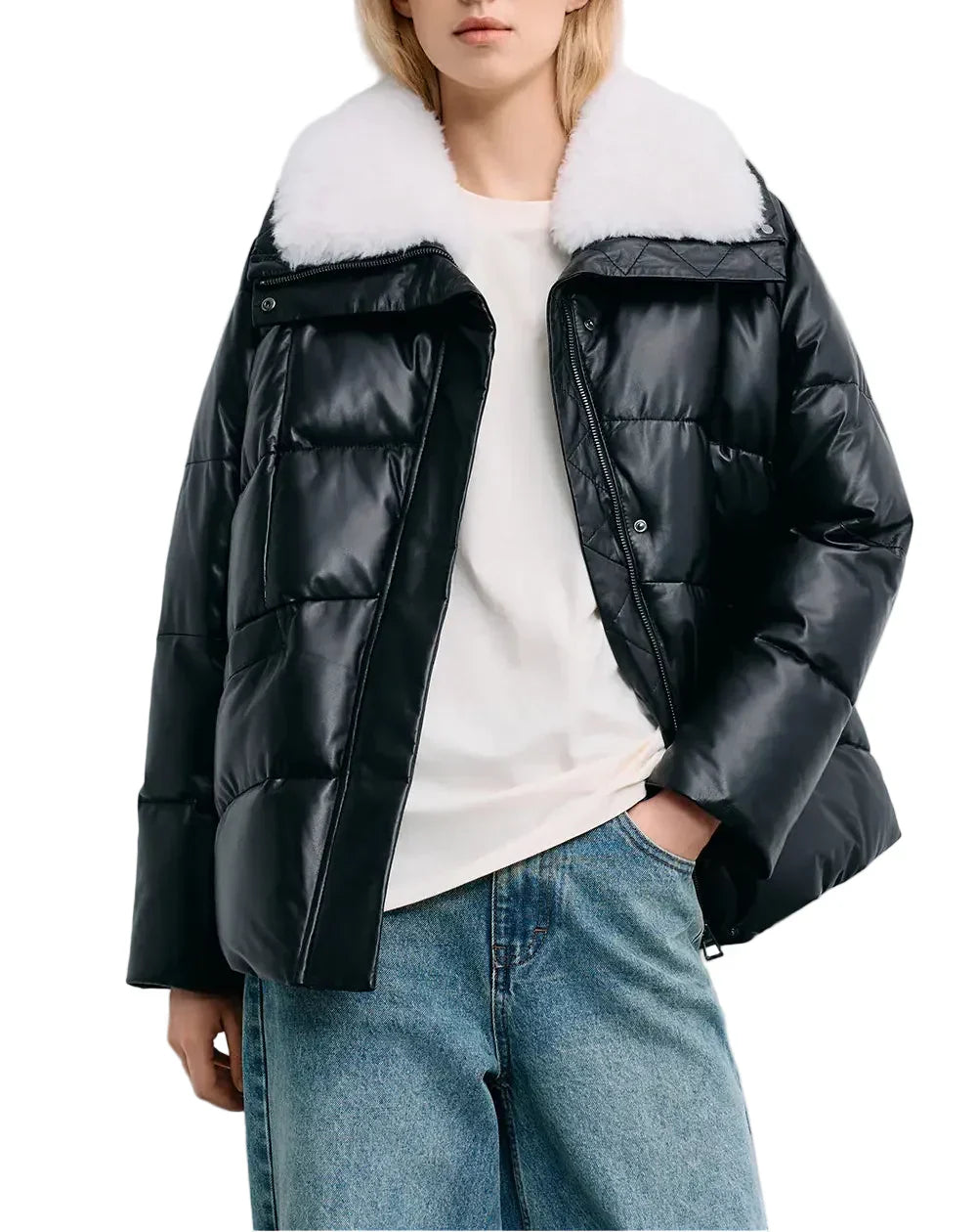 Close-up of a black leather puffer jacket with a oversized white fluffy collar and boxy fit, shown against a plain white background.