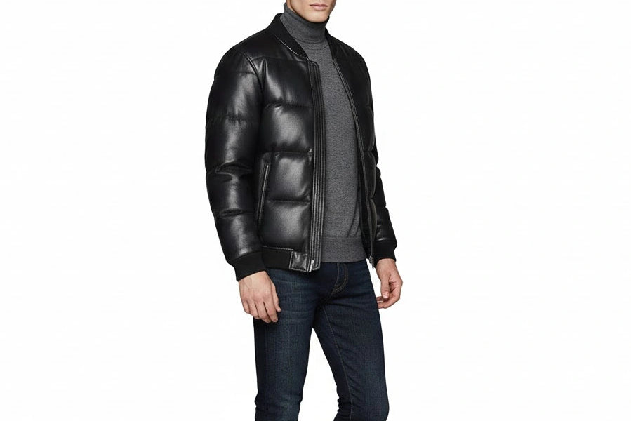 front right side view Man wearing premium handcrafted black sheepskin leather puffer jacket with antique brass YKK hardware by LeatherTex