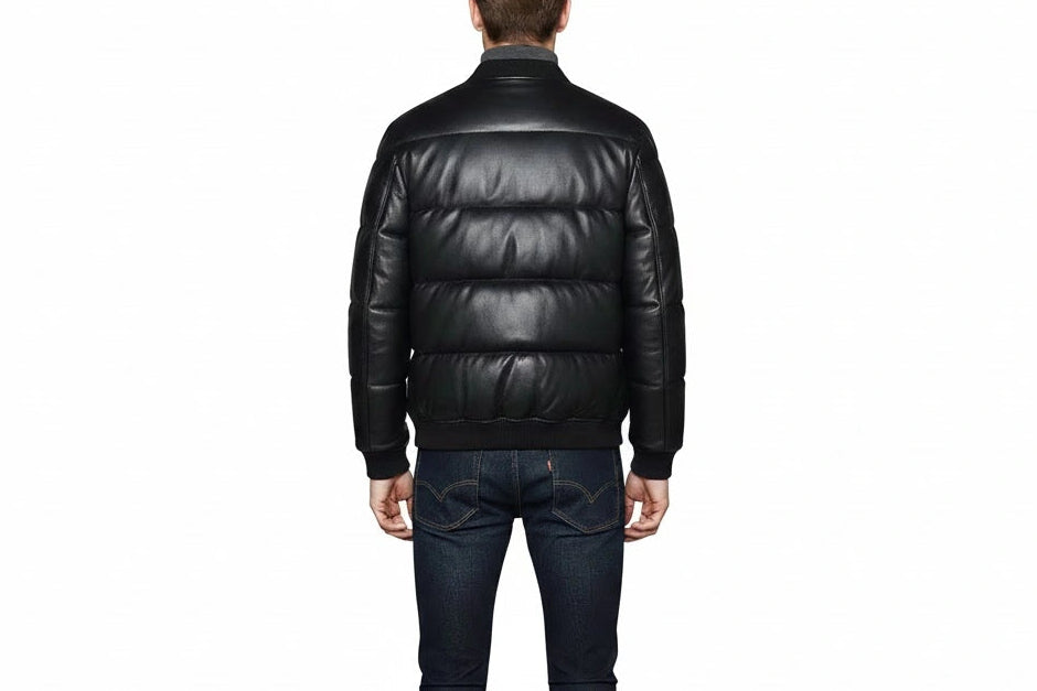 back view Man wearing premium handcrafted black sheepskin leather puffer jacket with antique brass YKK hardware by LeatherTex