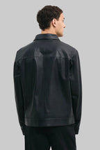 BACK POSE Men's black leather jacket made from premium full grain leather with front zipper closure, classic collar, and modern minimalist design by LEATHERTEXEU.