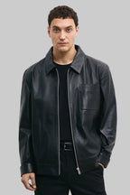 FRONT ZOOM POSE
Men's black leather jacket made from premium full grain leather with front zipper closure, classic collar, and modern minimalist design by LEATHERTEXEU.